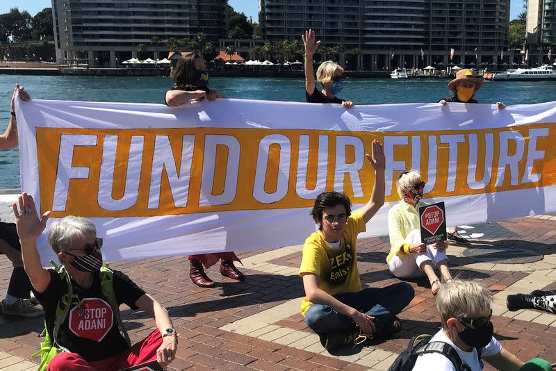 Ambrose Hayes, a 15-year-old climate change activist, takes part in an event as part of the Fund Our Future Not Gas climate rally in Sydney