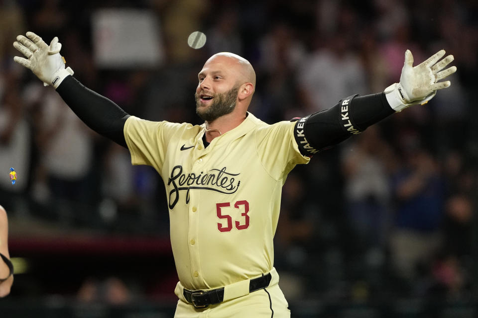 Arizona Diamondbacks' Christian Walker (53) celebrates his two run walk-off home run against the Los Angeles Dodgers during the 10th inning of a baseball game, Tuesday, April 30, 2024, in Phoenix. (AP Photo/Matt York)