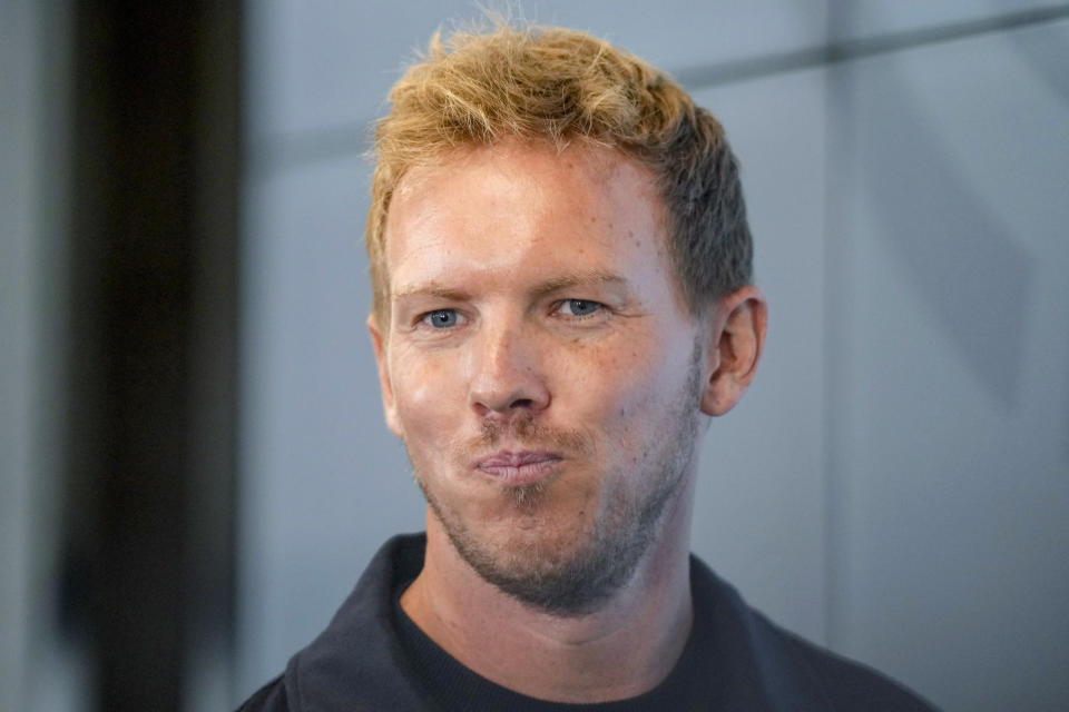 New coach of German national soccer team Julian Nagelsmann goes to a press conference in Frankfurt, Germany, Friday, Sept. 22, 2023. (AP Photo/Michael Probst)