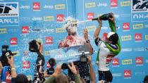 <p>Champagne to the face for Fanning after a 2013 triumph in France.</p>
