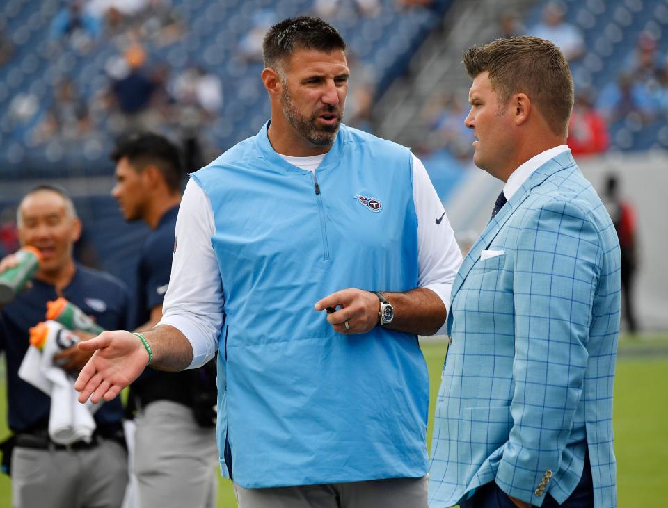 Titans head coach Mike Vrabel and General Manager Jon Robinson chat before the game at Nissan Stadium Sunday, Sept. 16, 2018, in Nashville, Tenn.