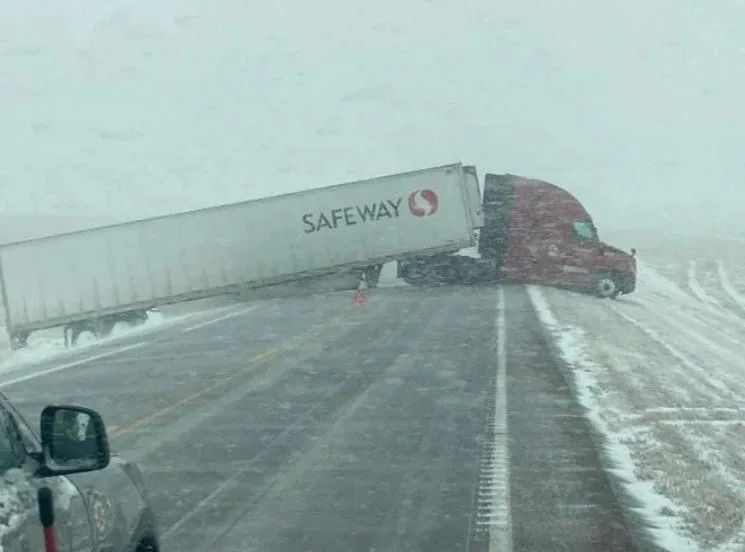 A semi truck and trailer blocking a major highway on the Pine Ridge Reservation during Winter Storm Diaz.