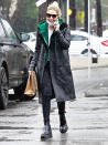 <p>Ashley Benson takes a call while out at Oaks Gourmet Market in L.A. on Dec. 30.</p>