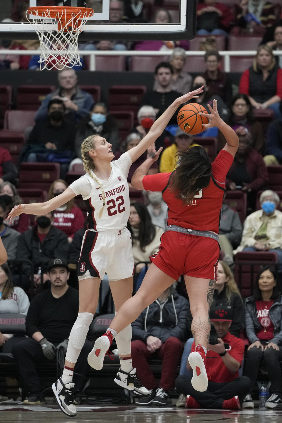 Stanford forward Cameron Brink, left, blocks a shot by Utah forward Alissa Pili during the first half of an NCAA college basketball game in Stanford, Calif., Friday, Jan. 20, 2023. (AP Photo/Godofredo A. Vásquez)