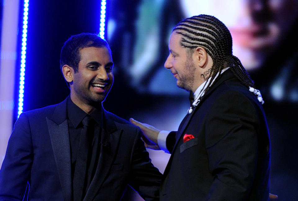 CULVER CITY, CA - AUGUST 25: Comedians Aziz Ansari and Jeffrey Ross speak onstage during The Comedy Central Roast of James Franco at Culver Studios on August 25, 2013 in Culver City, California. The Comedy Central Roast Of James Franco will air on September 2 at 10:00 p.m. ET/PT.  (Photo by Kevin Winter/Getty Images for Comedy Central)