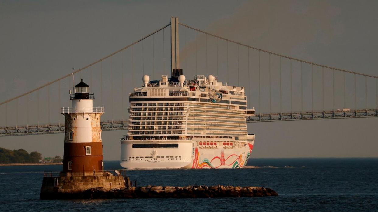 PHOTO: The Norwegian Joy cruise ship sails past the Robbins Reef Lighthouse on its way to the Verrazzano-Narrows Bridge in New York City, May 21, 2023. (Gary Hershorn/ABC News)