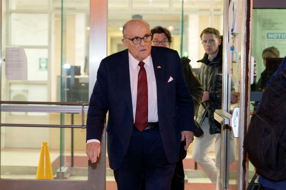 Former Mayor of New York Rudy Giuliani leaves the federal courthouse in Washington on Dec. 11, 2023. The trial will determine how much Rudy Giuliani will have to pay two Georgia election workers who he falsely accused of fraud while pushing President Donald Trump's baseless claims after he lost the 2020 election.