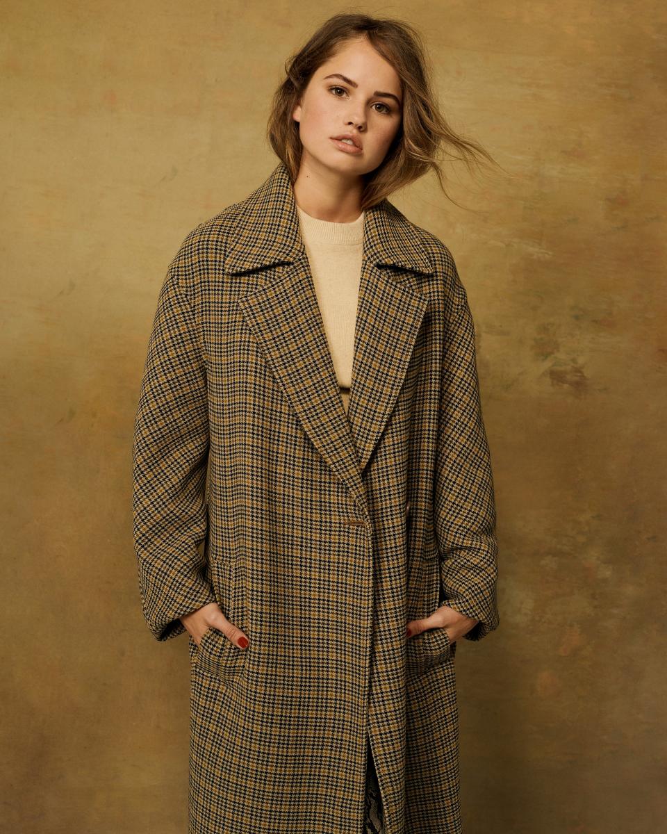 <cite class="credit">Photo by: Hanna Tveite | <em><strong>A.L.C. Copeland Coat,</strong> $1,295. Alctd.com.</em> <em><strong>HYKE Cashmere Sweater,</strong> Price Upon Request. Hyke.jp.</em></cite>