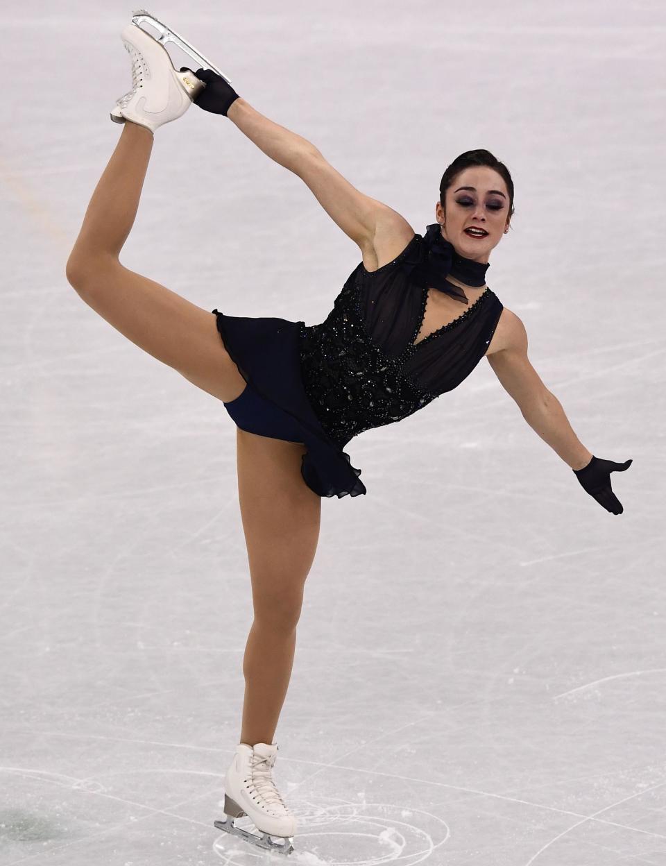 <p>Canada's Kaetlyn Osmond competed in the women's single skating short program of the figure skating in a daring black sequinned number. Her costume features a low-cut to and hundreds of glittering sequins.</p>