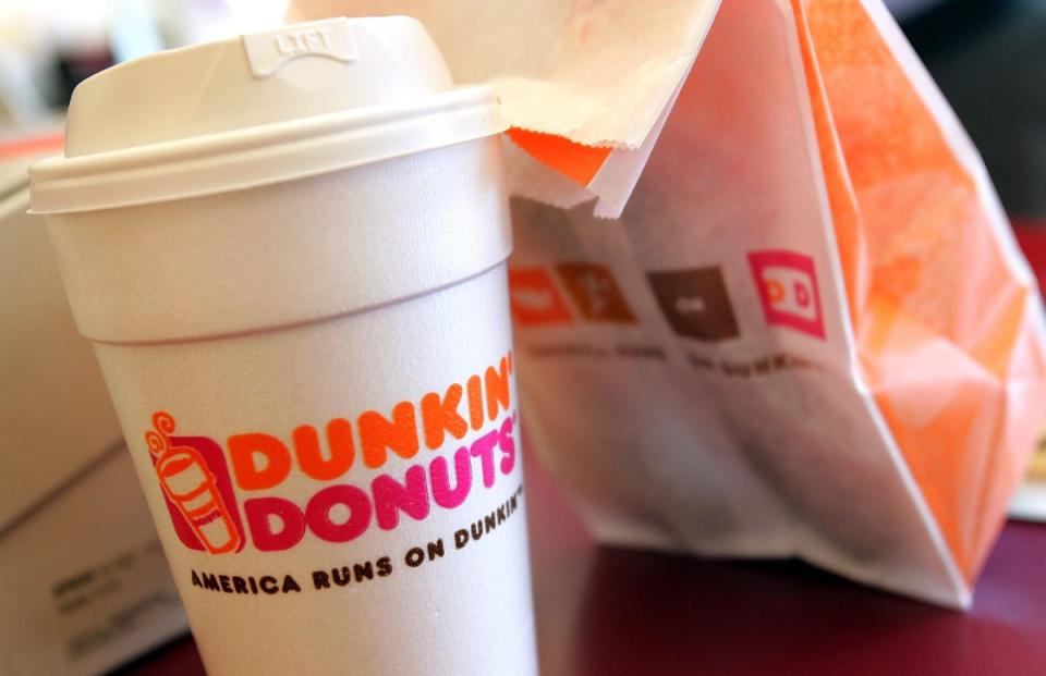 “America may run on Dunkin’, but our client had to re-learn how to walk due to the severity of her burns” (Getty Images)