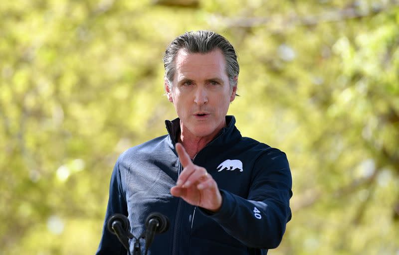 FILE PHOTO: California Governor Gavin Newsom speaks during a visit by U.S. First Lady Jill Biden, at The Forty Acres, the first headquarters of the United Farm Workers labor union, in Delano, California