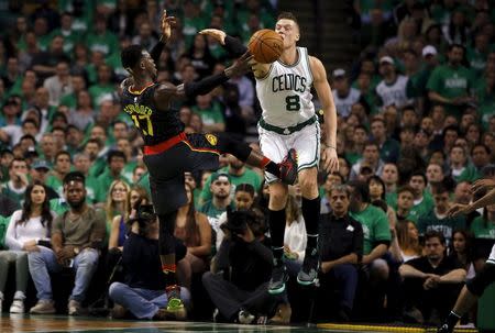 Apr 22, 2016; Boston, MA, USA; Atlanta Hawks guard Dennis Schroder (17) works the ball against Boston Celtics forward Jonas Jerebko (8) during the second quarter in game three of the first round of the NBA Playoffs at TD Garden. Mandatory Credit: David Butler II-USA TODAY Sports TPX IMAGES OF THE DAY