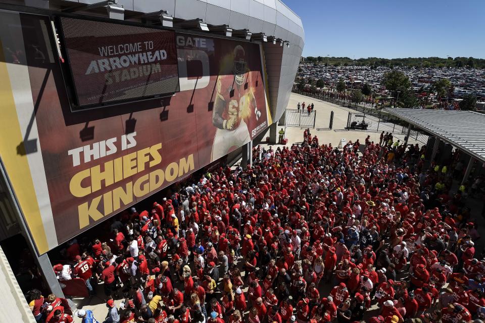 FILE - In this Sept. 11, 2016, file photo, Kansas City Chiefs fans line up to enter Arrowhead Stadium before their NFL football game against the San Diego Chargers in Kansas City, Mo. The crippling coronavirus pandemic has brought the entire world — including the sports world — to a standstill, and it shows no sign of going away anytime soon. That has left fans, stadium workers, team owners, sponsors and yes, even players, wondering what life will be like when games finally resume. (AP Photo/Reed Hoffmann, File)