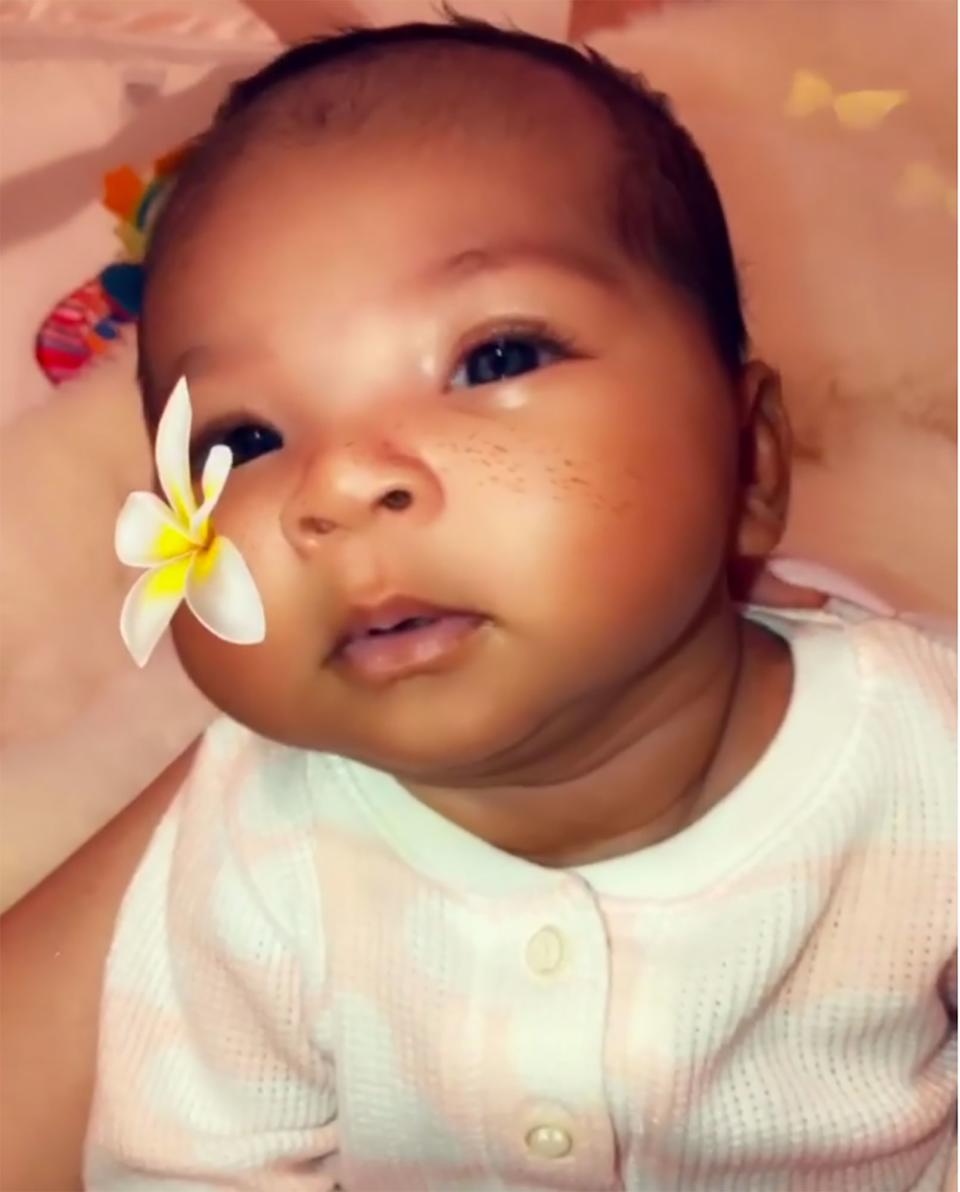 Those cheeks! Khloé gave fans a first look at her adorable daughter on her baby girl's 1-month birthday.