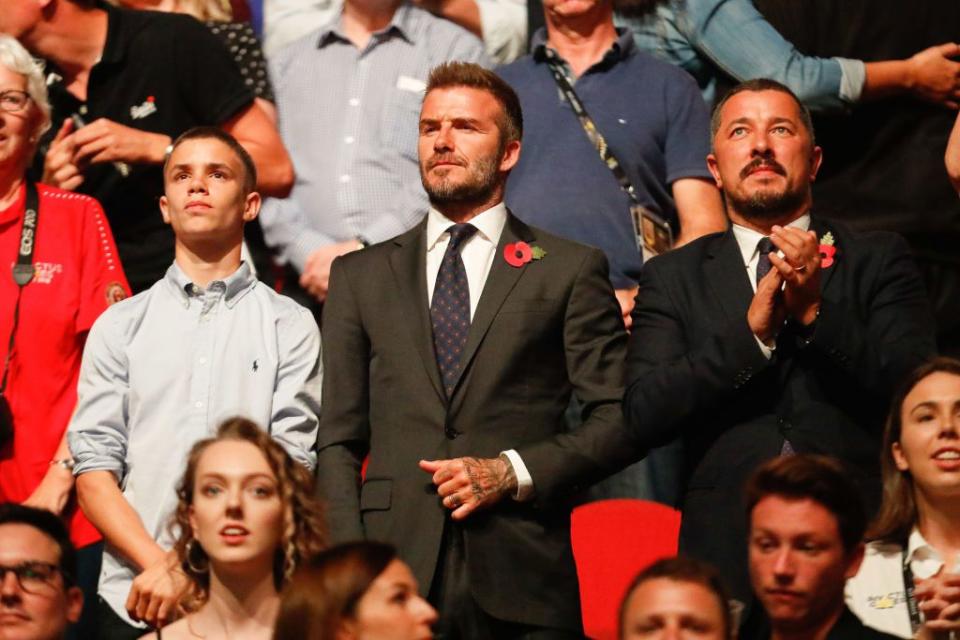David Beckham and his son Romeo were in the audience.