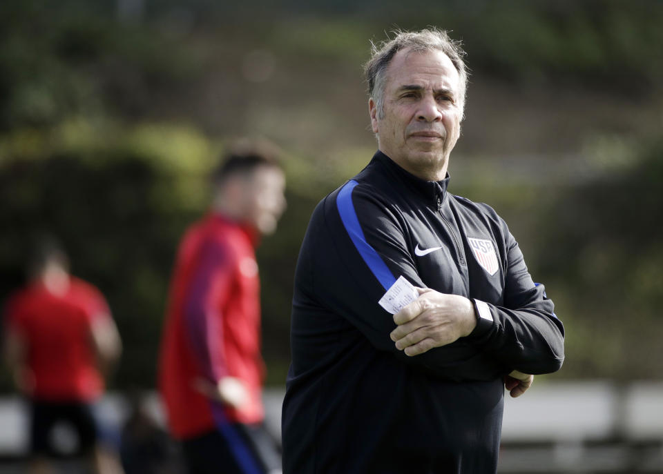 FILE - In this Jan. 11, 2017, file photo, United States coach Bruce Arena watches his team during soccer practice in Carson, Calif. If the U.S. fails to beat Honduras on Friday, March 24, 2017, in San Jose, Calif., the Americans would be winless in the final round of World Cup qualifying with seven games left. Only one team has qualified from a similar start, Trinidad and Tobago in 2006. A(P Photo/Jae C. Hong, File)