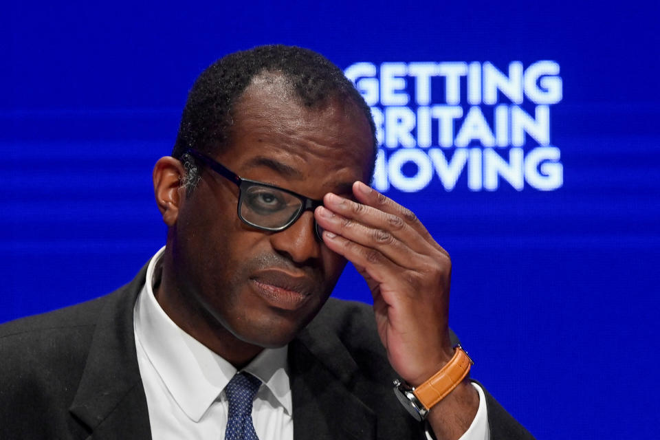 British Chancellor of the Exchequer Kwasi Kwarteng adjusts his glasses during Britain's Conservative Party's annual conference in Birmingham, Britain, October 3, 2022. REUTERS/Toby Melville