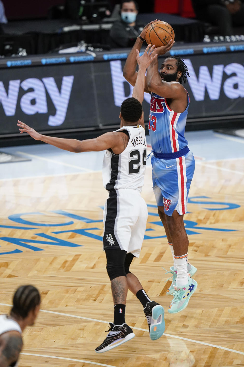 Brooklyn Nets' James Harden, right, shoots over San Antonio Spurs' Devin Vassell during the second half of an NBA basketball game Wednesday, May 12, 2021, in New York. (AP Photo/Frank Franklin II)