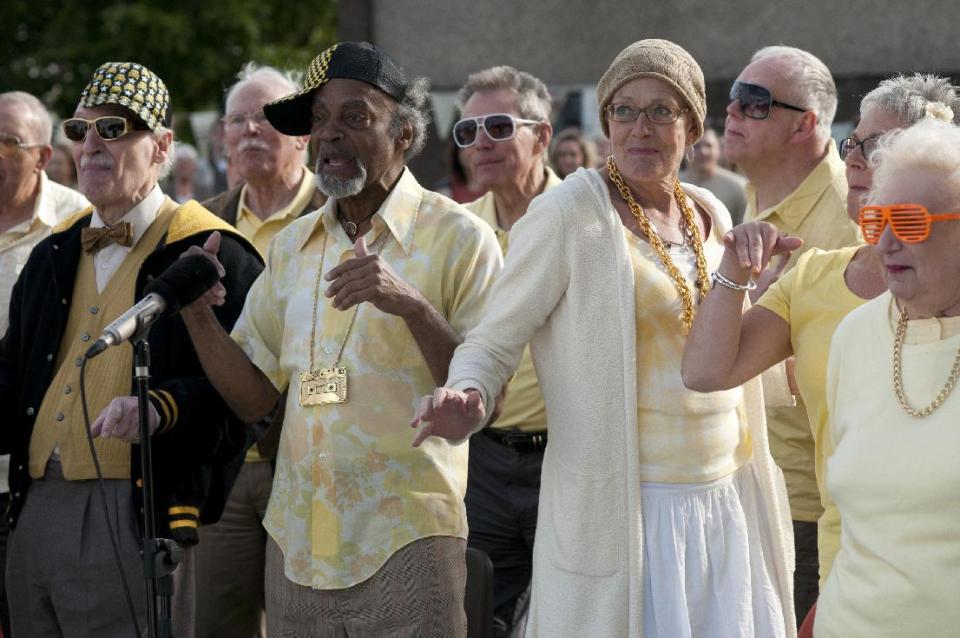 This film image released by the Toronto International Film Festival shows Vanessa Redgrave, center right, as a terminally ill choir singer in a scene from "Song for Marion." Festival rganizers announced Tuesday, Aug. 14, 2012, that Redgrave’s “Song for Marion” will close next month’s Toronto festival, which runs Sept. 6 to 16 and is one of the key cinema gatherings that kick off Hollywood’s fall movie lineup and Academy Awards season. (AP Photo/Toronto International Film Festival)