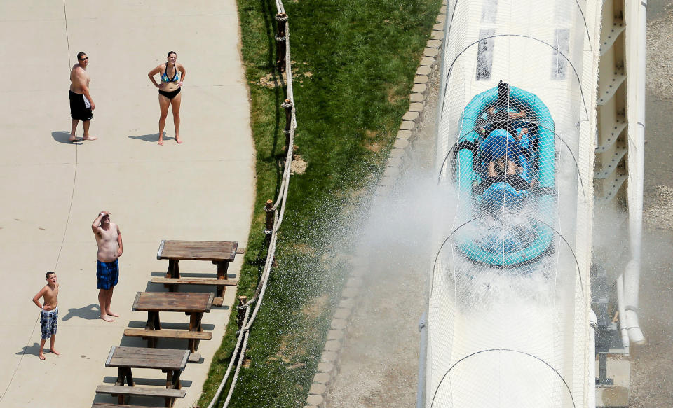Riders are propelled by jets of water as they go over a hump on the water slide at Schlitterbahn Water Park in Kansas City, where the boy was killed. Source: AP Photo/Charlie Riedel, File