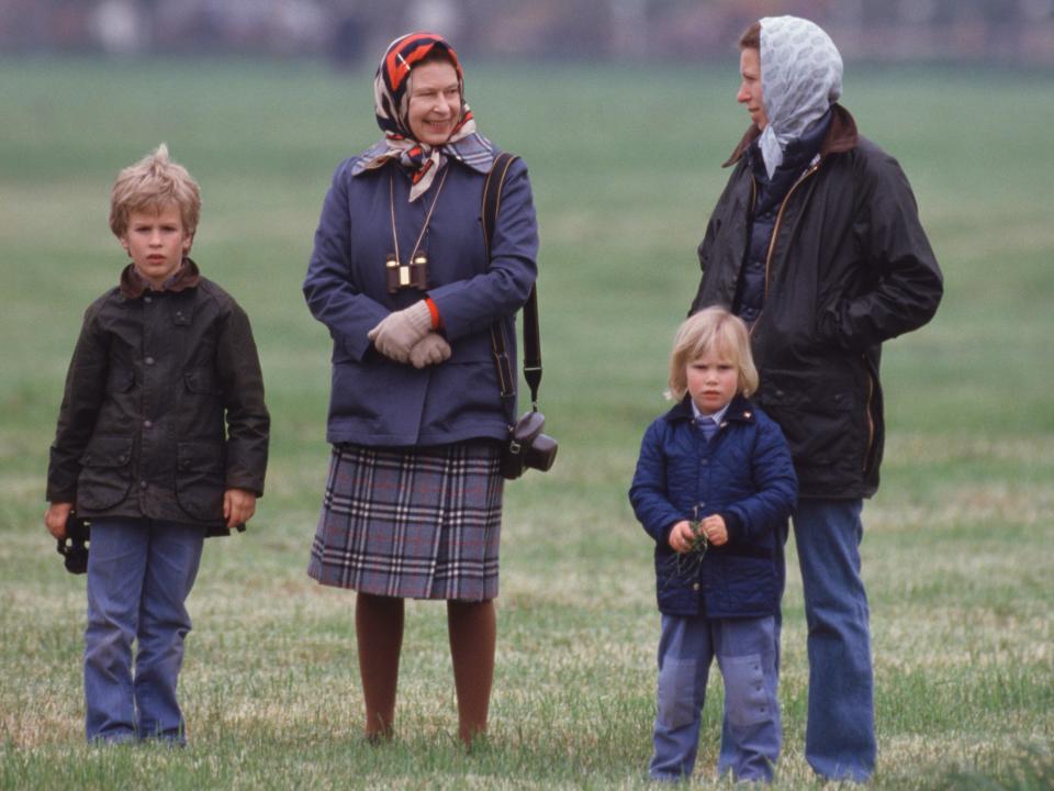 Queen Elizabeth II and Princess Anne with Anne's children Peter and Zara Phillips in Windsor on May 12, 1985.