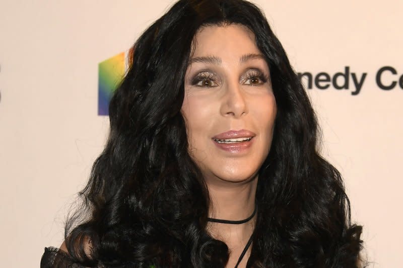 2018 Kennedy Center Honoree singer and actress Cher poses for photographers on the red carpet as she arrives for the gala at the Kennedy Center in Washington, DC. File Photo by Mike Theiler/UPI