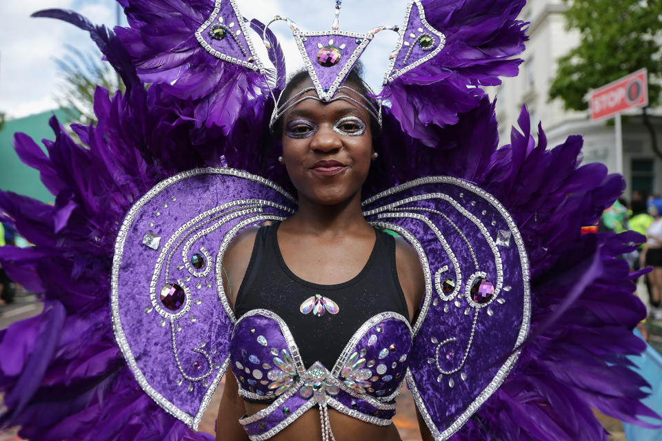 <p>Performers in costume parade on the first day of the Notting Hill Carnival in west London on August 28, 2016. (Photo: DANIEL LEAL-OLIVAS/AFP/Getty Images) </p>