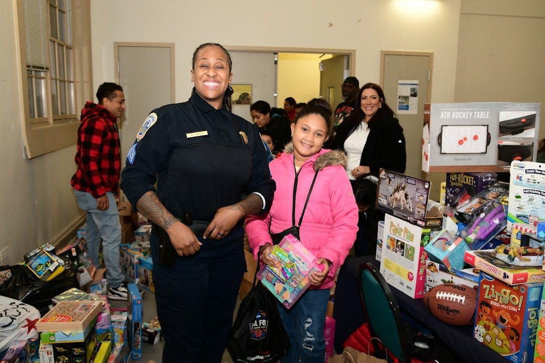 Sgt. Nicole Brown poses for a photo during a community event