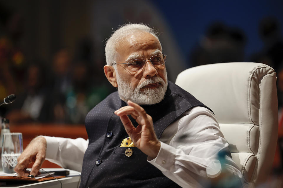 India's Prime Minister Narendra Modi gestures at the plenary session during the 2023 BRICS Summit in Johannesburg, South Africa, Wednesday, Aug. 23, 2023. (Gianluigi Guercia/Pool via AP)