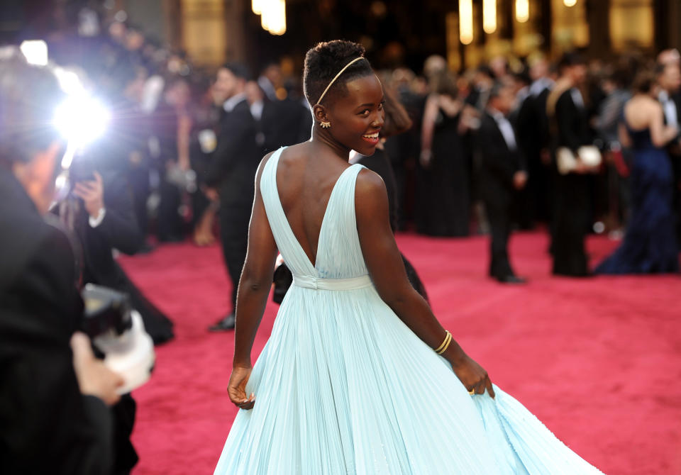Lupita Nyong'o arrives at the Oscars on Sunday, March 2, 2014, at the Dolby Theatre in Los Angeles. (Photo by Chris Pizzello/Invision/AP)