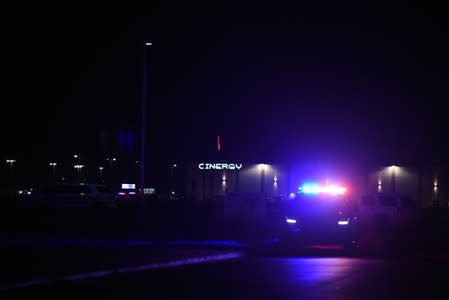 Police vehicles are seen after a man went on a shooting spree in Odessa