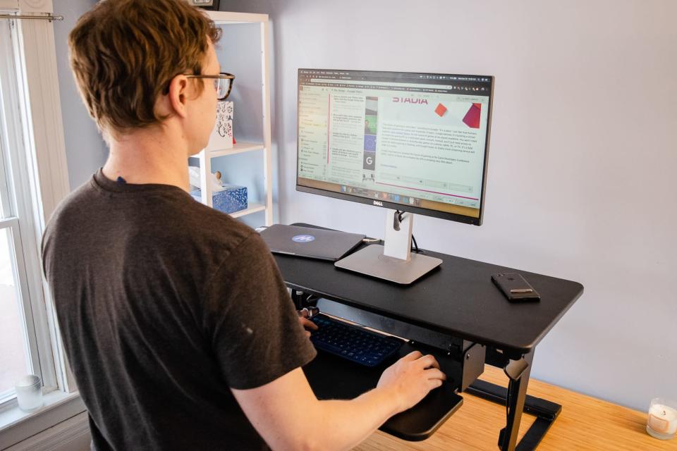 Standing desk converters