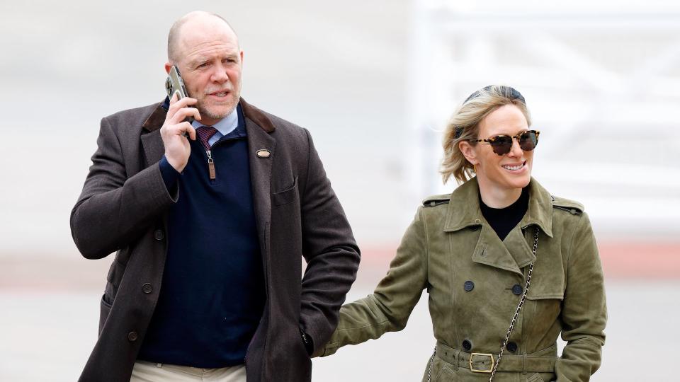 Zara and Mike Tindall walking together at Cheltenham Racecourse