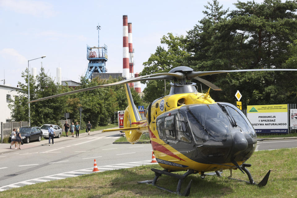 An airborne ambulance near the Rydultowy coal mine near the city of Rybnik, in southern Poland, on Thursday, July 11, 2024. Officials say that two Polish coal miners remain unaccounted for and at least 15 have been injured after a powerful tremor shook the Rydultowy coal mine. Rescuers are struggling to reach dozens of others. (AP Photo/Katarzyna Zaremba-Majcher)