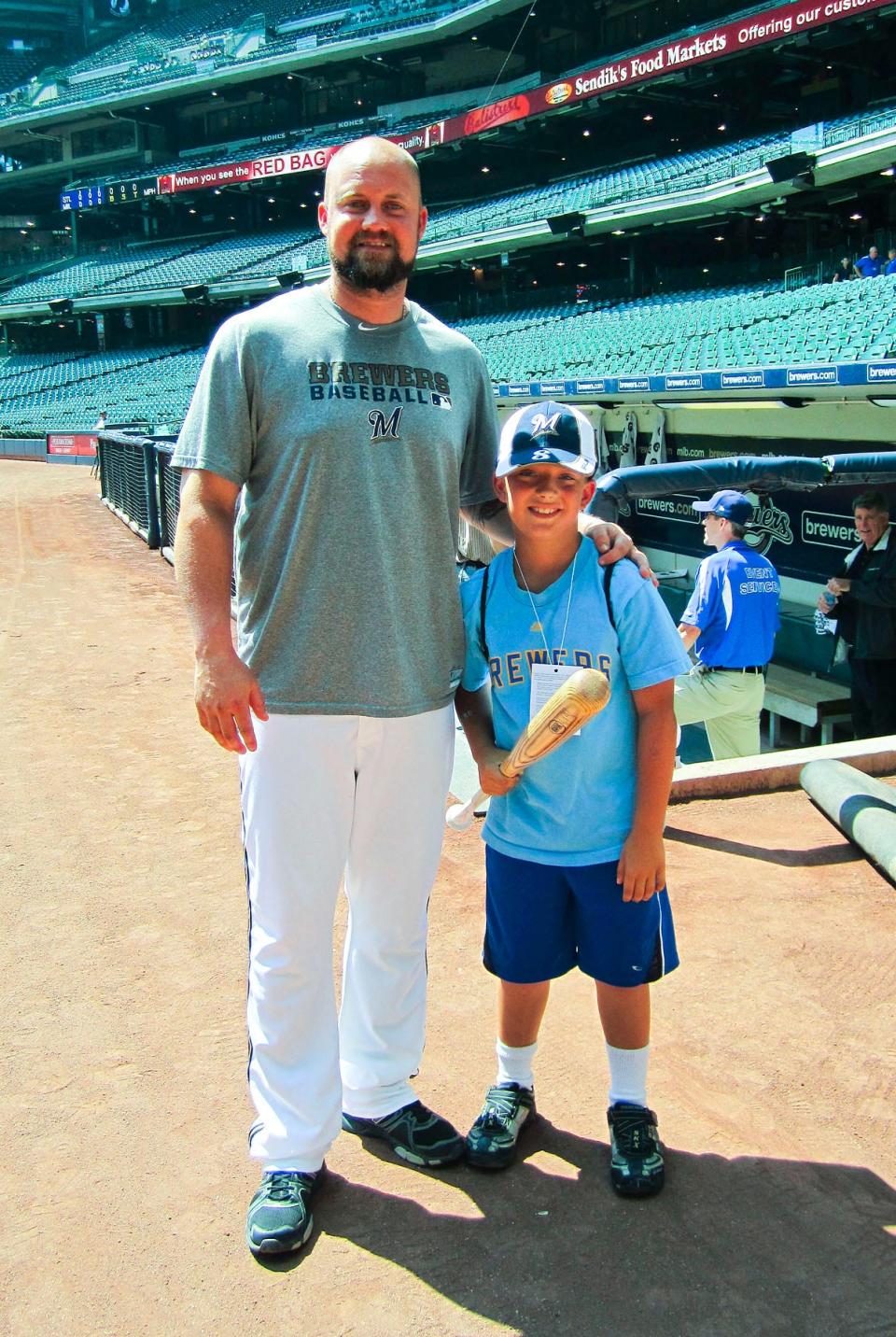 Brewers third baseman Casey McGehee poses with Clayton Wollner, 7, of Sussex, in 2011.