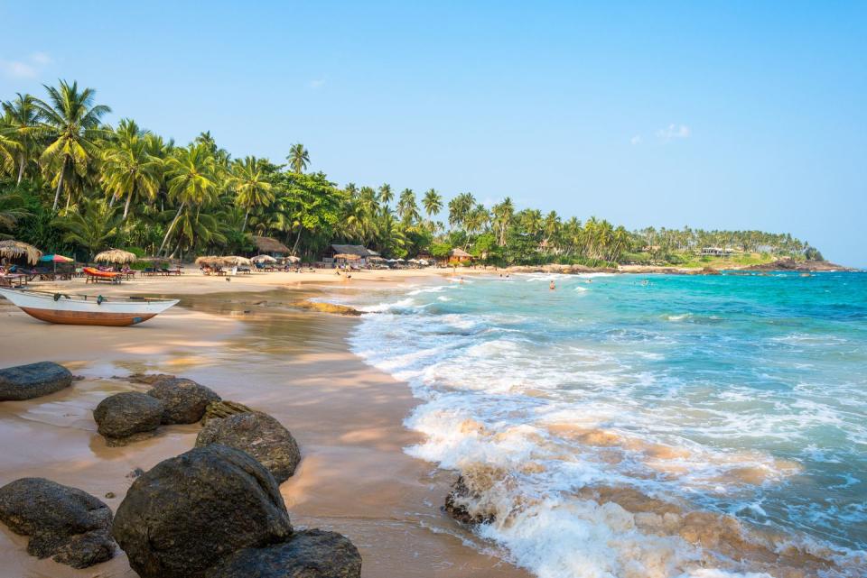 <p>The Indian Ocean destination has been crowned the winning country of <a href="https://www.lonelyplanet.com/best-in-travel/countries" rel="nofollow noopener" target="_blank" data-ylk="slk:Lonely Planet’s Best In Travel;elm:context_link;itc:0;sec:content-canvas" class="link ">Lonely Planet’s Best In Travel</a> for next year.</p><p> Following a brutal civil war which ravaged many parts of the country from 1983 to 2009, tourists have been slowly and steadily returning to the region as previously off-limits areas have opened up. </p><p><a class="link " href="https://go.redirectingat.com?id=127X1599956&url=https%3A%2F%2Fwww.skyscanner.net%2Fflights-to%2Flk%2Fcheap-flights-to-sri-lanka.html&sref=https%3A%2F%2Fwww.harpersbazaar.com%2Fuk%2Ftravel%2Ftravel-guides%2Fg13140492%2Fwhere-to-go-on-holiday-travel-destination-trends%2F" rel="nofollow noopener" target="_blank" data-ylk="slk:BOOK FLIGHTS;elm:context_link;itc:0;sec:content-canvas">BOOK FLIGHTS</a></p><p>There’s so much to do in the country too. <a href="https://www.harpersbazaar.com/uk/travel/g16760684/8-ways-to-make-your-sri-lanka-trip-truly-memorable/" rel="nofollow noopener" target="_blank" data-ylk="slk:Our Bazaar guide;elm:context_link;itc:0;sec:content-canvas" class="link ">Our Bazaar guide</a> recommends travelling on the famous train ride from Kandy to Ella, climbing Lion’s Rock, heading on a safari, visiting a tea plantation and seeing at least one of the many beautiful beaches. </p>