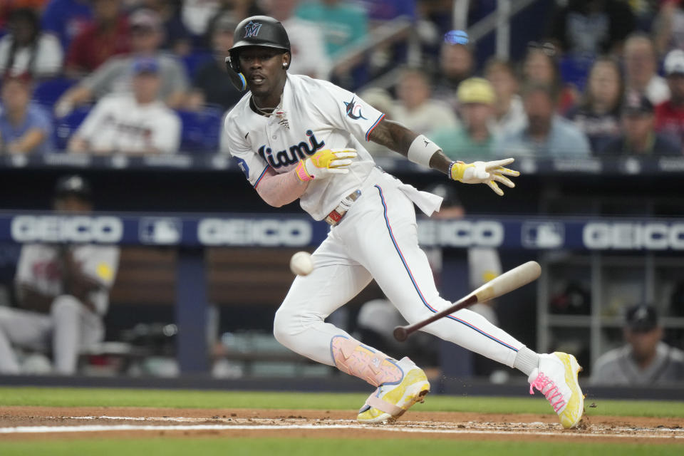 FILE -Miami Marlins' Jazz Chisholm Jr. attempts a bunt during the first inning of a baseball game against the Atlanta Braves, Sunday, Sept. 17, 2023, in Miami. Jazz Chisholm Jr. and the Miami Marlins went to salary arbitration Wednesday, Jan. 31, 2024 when the outfielder asked a three-person panel to be paid $2.9 million this year and the team asked he be given $2,625,000.(AP Photo/Lynne Sladky, File)