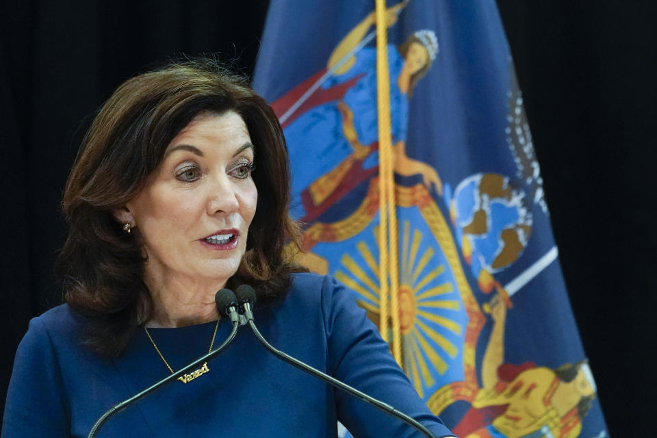 New York Gov. Kathy Hochul speaks at an event, Friday, Dec. 10, 2021, in New York. Hochul announced that masks will be required in all indoor public places in New York State unless the businesses or venues implement a vaccine requirement. (AP Photo/Mary Altaffer)