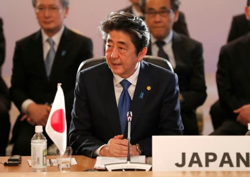 Japanese Prime Minister Shinzo Abe was likely to push for continued pressure on Pyongyang at a trilateral summit with South Korea's President Moon Jae-in and Chinese Premier Li Keqiang