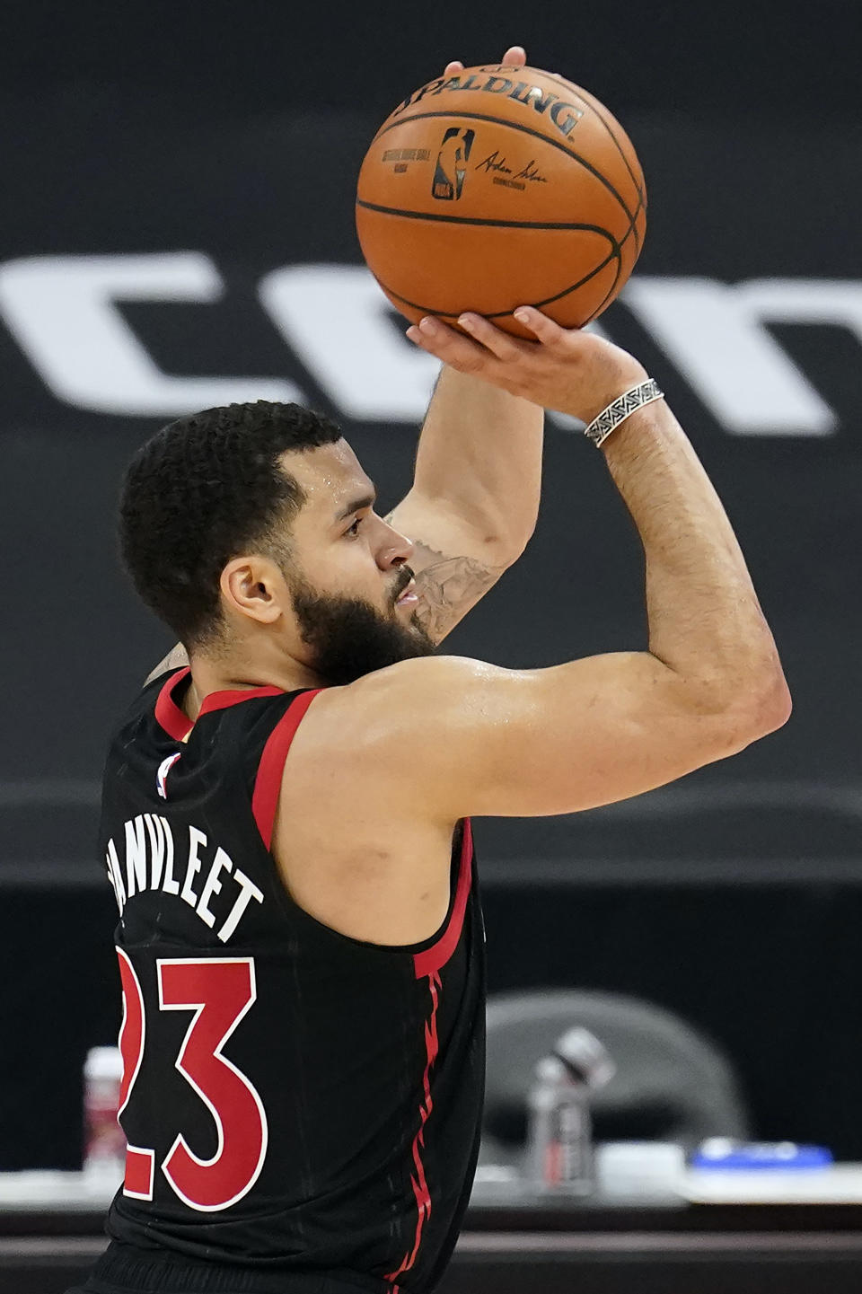 Toronto Raptors guard Fred VanVleet (23) puts up a shot against the Philadelphia 76ers during the second half of an NBA basketball game Sunday, Feb. 21, 2021, in Tampa, Fla. (AP Photo/Chris O'Meara)