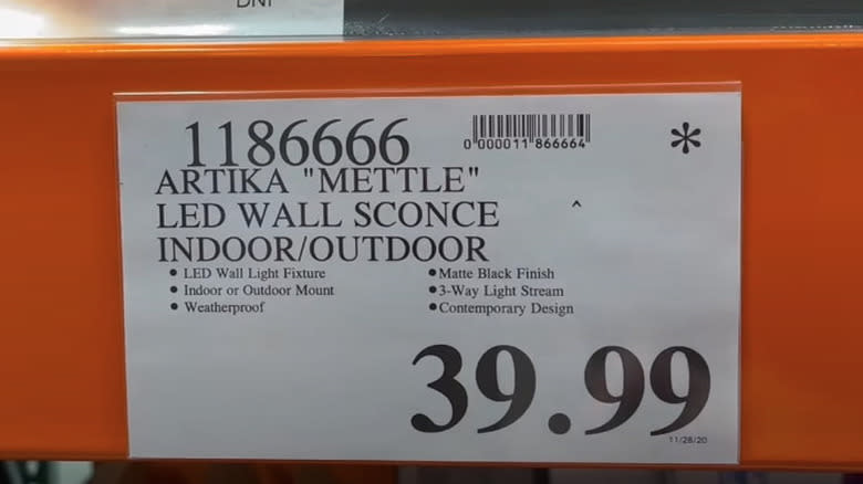 Costco price card with asterisk