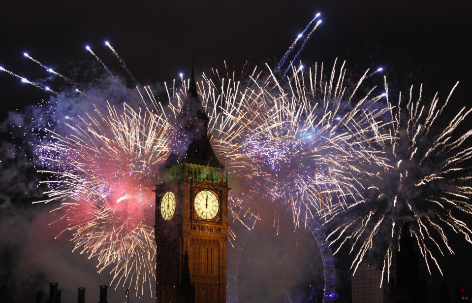 LONDON, ENGLAND - JANUARY 01: Fireworks light up the London skyline and Big Ben just after midnight on January 1, 2012 in London, England. Thousands of people lined the banks of the River Thames in central London to ring in the New Year with a spectacular fireworks display. (Photo by Dan Kitwood/Getty Images)