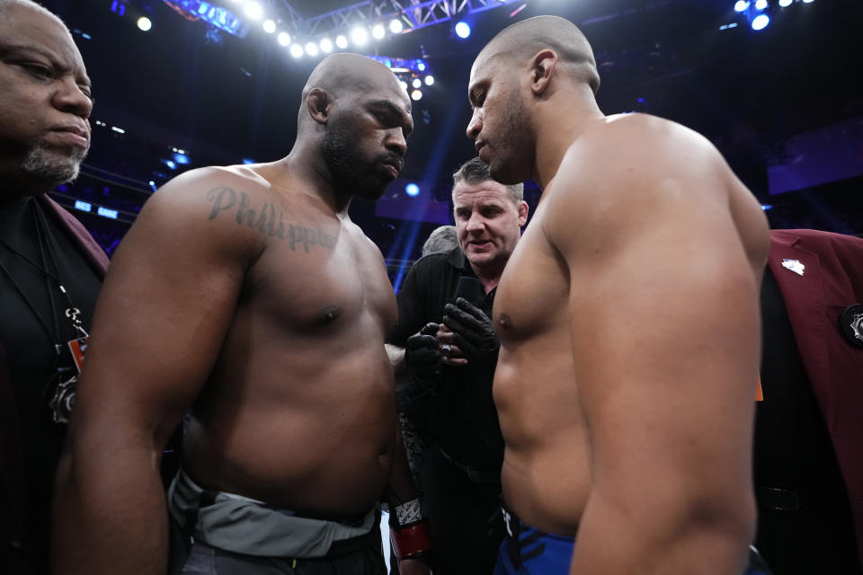 LAS VEGAS, NEVADA - MARCH 04: (L-R) Jon Jones faces Ciryl Gane of France inside the Octagon in the UFC heavyweight championship fight during the UFC 285 event at T-Mobile Arena on March 04, 2023 in Las Vegas, Nevada. (Photo by Jeff Bottari/Zuffa LLC via Getty Images)