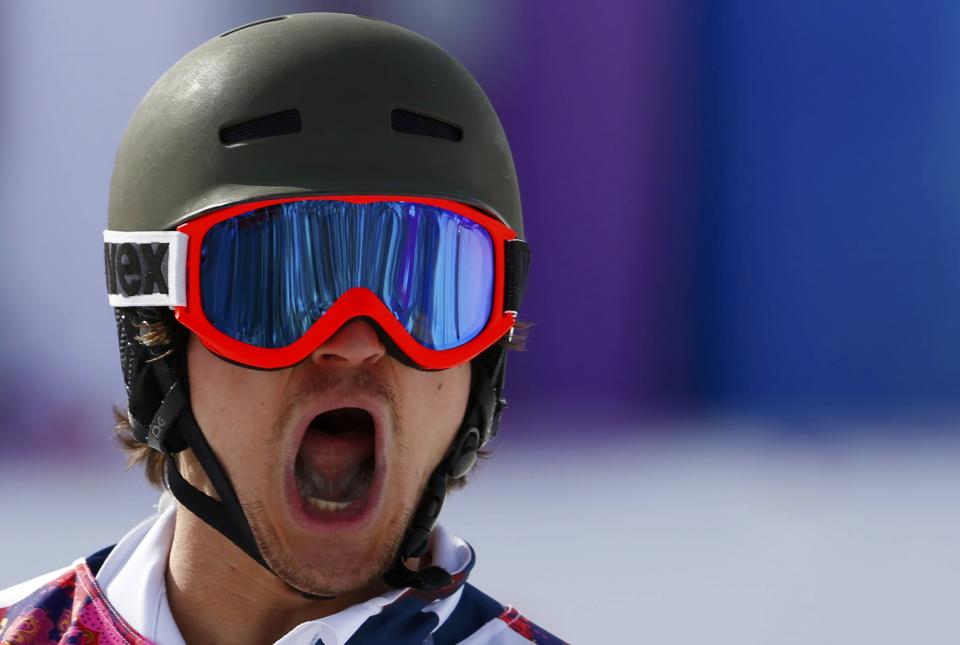 Russia's Vic Wild reacts during the men's parallel slalom snowboard finals at the 2014 Sochi Winter Olympic Games in Rosa Khutor February 22, 2014. REUTERS/Lucas Jackson (RUSSIA - Tags: OLYMPICS SPORT SNOWBOARDING)