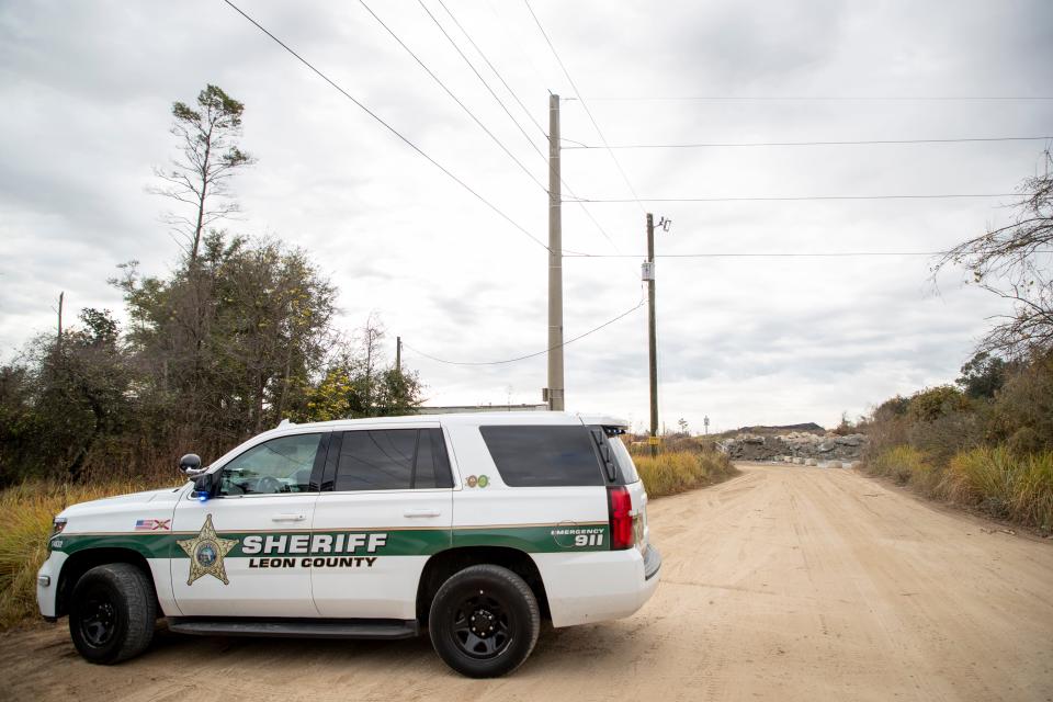 A Leon County Sheriff's SUV is parked at Crowder Excavating & Land sand pit off of Tram Road after a plane crashed on the property Tuesday, Dec. 7, 2021. 