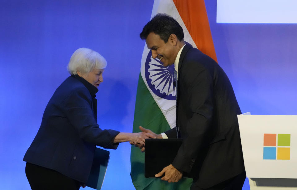 U.S. Secretary of the Treasury Janet L. Yellen is being welcomed by Anant Maheshwari of Microsoft at the Microsoft India Development Center in Noida, on the outskirts of New Delhi, India, Friday, Nov. 11, 2022. U.S. Secretary of the Treasury Janet L. Yellen underscored the importance of establishing an Indo-Pacific economic framework that will strengthen supply chains with trusted trading partners like India as she prepared to meet Indian leaders in New Delhi, officials said Friday. (AP Photo/Manish Swarup)