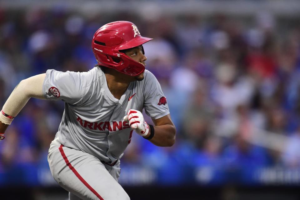 Arkansas baseball's Kendall Diggs watches his two-run double during the Razorbacks' 10-3 win over Kentucky Friday, May 3, 2024.