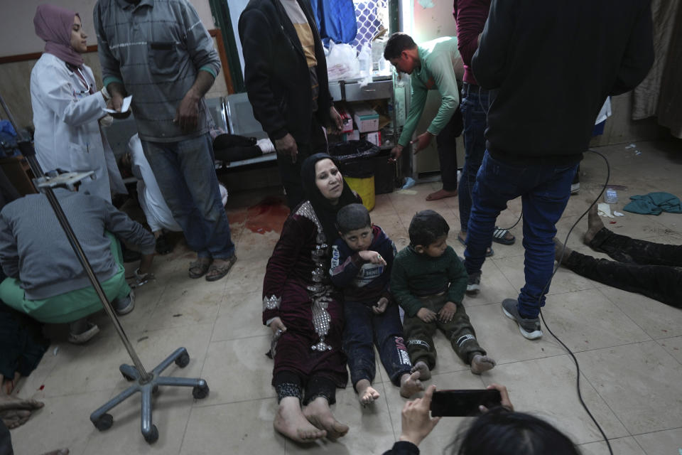 Palestinians wounded in the Israeli bombardment of the Gaza Strip are brought to Al Aqsa hospital in Deir al Balah, Gaza Strip, Friday, March 8, 2024. (AP Photo/Adel Hana)