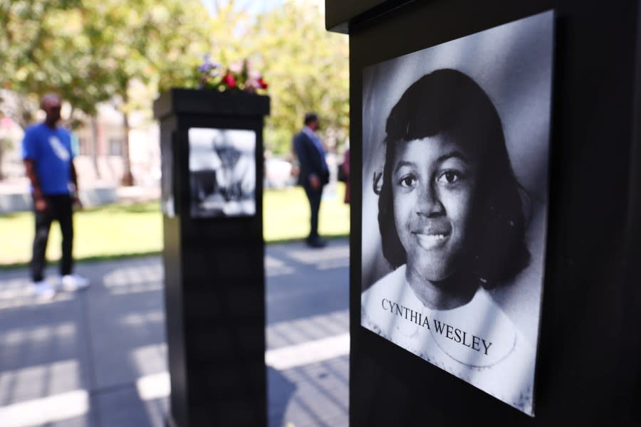 A photograph of Cynthia Wesley is displayed along with others at the Say Their Names memorial exhibit at Martin Luther King Jr. Promenade on July 20, 2021 in San Diego, California. The traveling memorial is sponsored by the San Diego African American Museum of Fine Art (SDAAMFA) and features photographs of 200 Black Americans who lost their lives due to systemic racism and racial injustice. 14-year-old Cynthia Wesley was one of four Black girls killed in the KKK bombing of the 16th Street Baptist Church in 1963 in Birmingham. (Photo by Mario Tama/Getty Images)