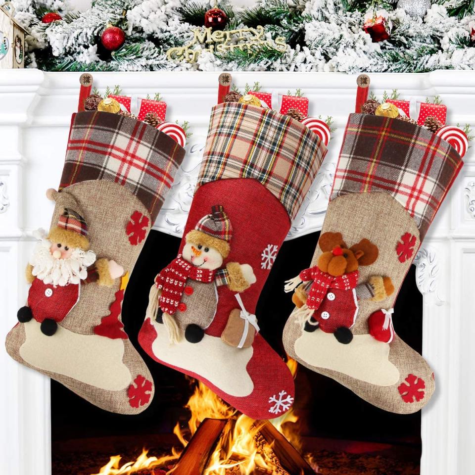 Aitey christmas stockings, christmas stockings hung over a fireplace mantle